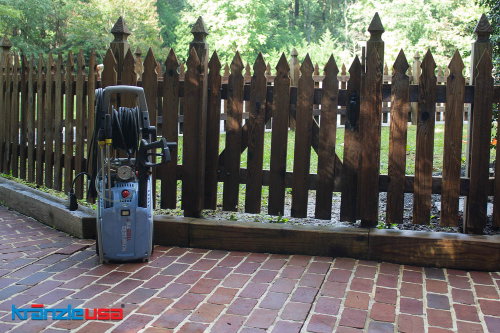 Fence and brick walk way cleaned with a Kranzle 1122TST electric pressure washer